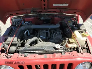 1999 Jeep Wrangler Sport with VIN 1J4FY19S7XP401120, listed as a Copart auction lot 64233665 with 129,708 mi miles and Salvage title. Bid and sale history available at DreamBid. Image 11.