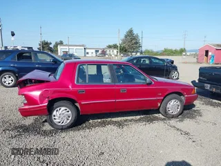 1993 Dodge Spirit z VIN 1B3XA4632PF677192, wystawiony jako IAAI lot #42157260 z przebiegiem 100 979 mil mil oraz . Historia ofert i sprzedaży dostępna na DreamBid. Obrazek 13.