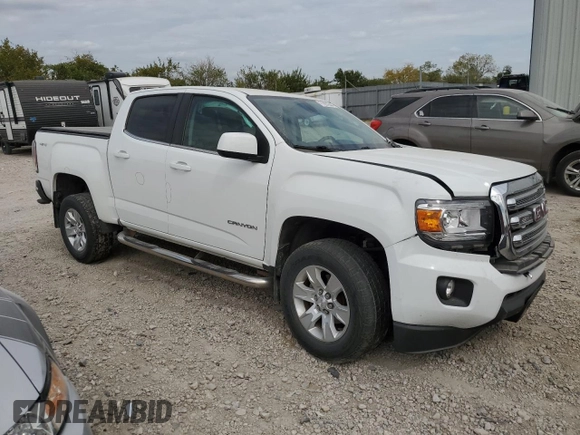 2016 GMC Canyon 4WD SLE with VIN 1GTG6CE37G1118407, listed as a Copart auction lot 71991644 with 79,515 mi miles and Salvage Title. Bid and sale history available at carsss.com. Image 4.