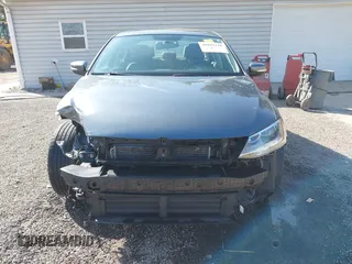 2015 Volkswagen Jetta Sedan 1.8T SE w/Connectivity with VIN 3VWD07AJ2FM312146, listed as a IAAI auction lot 41843238 with 107,741 mi miles. Bid and sale history available at carsss.com. Image 12.