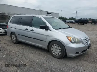 2010 Honda Odyssey LX z VIN 5FNRL3H29AB016853, wystawiony jako Copart lot #56602085 z przebiegiem 154 518 mil mil oraz Szkoda całkowita • Salvage title. Historia ofert i sprzedaży dostępna na DreamBid. Obrazek 4.
