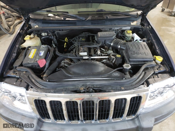 2002 Jeep Grand Cherokee Laredo with VIN 1J8GW48S92C197903, listed as a Copart auction lot 70524292 with 152,286 mi miles and Non Repairable. Bid and sale history available at carsss.com. Image 7.