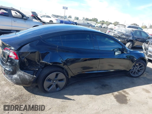 2022 Tesla Model 3 Long Range with VIN 5YJ3E1EB1NF313954, listed as a IAAI auction lot 41248187 with 31,247 mi miles and . Bid and sale history available at DreamBid. Image 12.