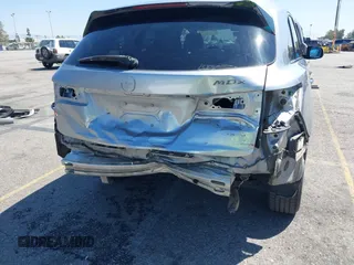 2016 Acura MDX w/Tech with VIN 5FRYD4H42GB030732, listed as a IAAI auction lot 41993867 with 152,279 mi miles. Bid and sale history available at carsss.com. Image 6.