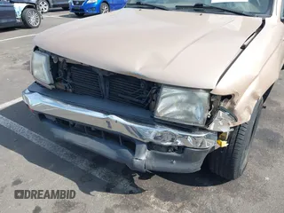 1999 Toyota Tacoma with VIN 4TAVL52N4XZ478703, listed as a IAAI auction lot 42504706 with 34,389 mi miles and . Bid and sale history available at DreamBid. Image 6.