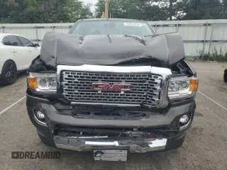 2019 GMC Canyon 4WD Denali with VIN 1GTG6EENXK1200430, listed as a Copart auction lot 65524334 with 54,813 mi miles and Salvage Title. Bid and sale history available at carsss.com. Image 5.
