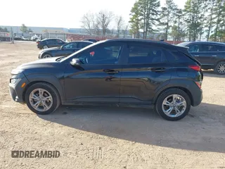 2023 Hyundai Kona SEL with VIN KM8K62AB0PU938484, listed as a IAAI auction lot 41722445 with 52,058 mi miles and . Bid and sale history available at DreamBid. Image 14.