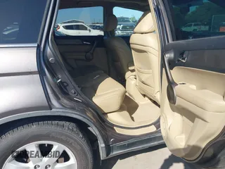 2009 Honda CR-V EX-L with VIN 5J6RE38729L018050, listed as a IAAI auction lot 41982215 with 144,163 mi miles and . Bid and sale history available at carsss.com. Image 8.