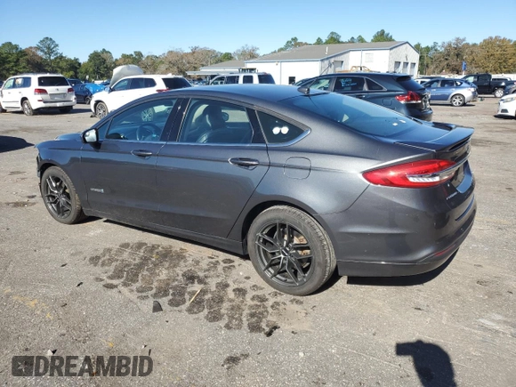 2017 Ford Fusion Hybrid SE with VIN 3FA6P0LU0HR374551, listed as a Copart auction lot 84612714 with 121,991 mi miles and Salvage title. Bid and sale history available at DreamBid. Image 2.