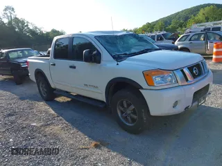 2014 Nissan Titan S with VIN 1N6AA0EC2EN504125, listed as a IAAI auction lot 42553290 with 117,363 mi miles and . Bid and sale history available at DreamBid. Image 1.