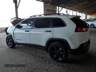 2017 Jeep Cherokee Altitude with VIN 1C4PJLAB3HW661754, listed as a Copart auction lot 64580105 with 62,427 mi miles and Salvage title. Bid and sale history available at DreamBid. Image 2.
