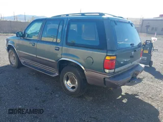 1997 Mercury Mountaineer z VIN 4M2DU55P2VUJ38223, wystawiony jako IAAI lot #42193880 z przebiegiem 220 694 mil mil oraz . Historia ofert i sprzedaży dostępna na DreamBid. Obrazek 3.