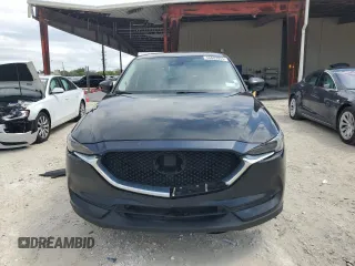 2020 Mazda CX-5 Grand Touring with VIN JM3KFBDM4L0738976, listed as a Copart auction lot 56683955 with 191,650 mi miles and Clean Title. Bid and sale history available at DreamBid. Image 5.