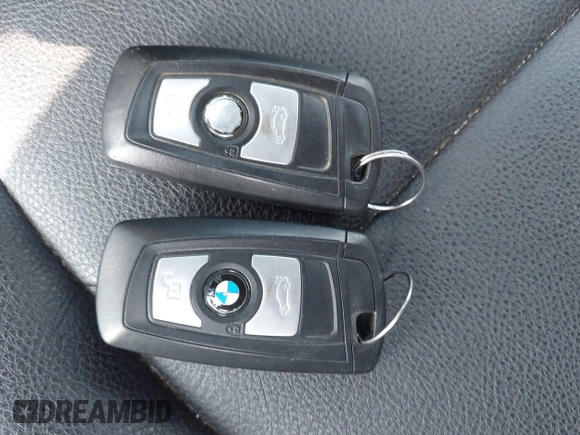 2015 BMW 3 Series 320i with VIN WBA3B1G5XFNT05903, listed as a IAAI auction lot 42063574 with Not Provided miles. Bid and sale history available at carsss.com. Image 11.