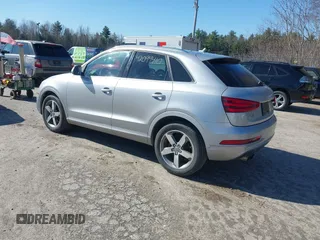2015 Audi Q3 2.0T Premium Plus with VIN WA1EFCFSXFR010015, listed as a IAAI auction lot 42099410 with 142,117 mi miles. Bid and sale history available at carsss.com. Image 3.