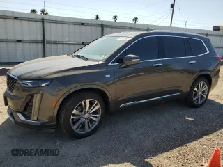 2020 Cadillac XT6 FWD Premium Luxury z VIN 1GYKPCRS1LZ199080, wystawiony jako Copart lot #52252865 z przebiegiem 68 494 mil mil oraz Szkoda całkowita • Salvage title. Historia ofert i sprzedaży dostępna na DreamBid. Obrazek 1.