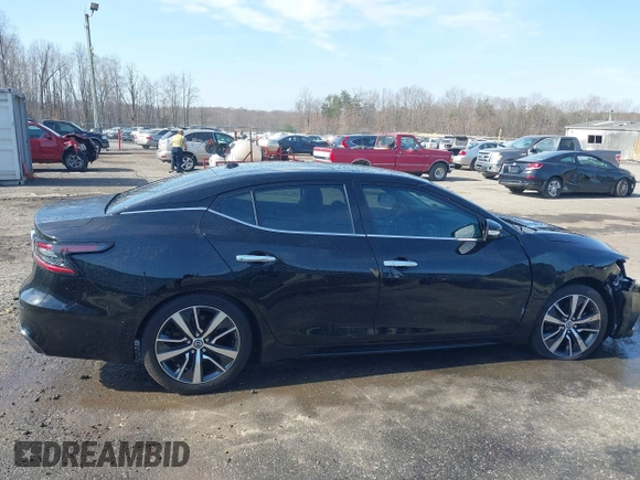 2019 Nissan Maxima SV with VIN 1N4AA6AV8KC371882, listed as a IAAI auction lot 41779671 with 107,296 mi miles and . Bid and sale history available at DreamBid. Image 14.