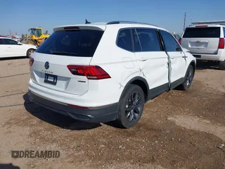 2022 Volkswagen Tiguan SE with VIN 3VV2B7AX2NM010932, listed as a IAAI auction lot 42007364 with 26,014 mi miles and . Bid and sale history available at DreamBid. Image 4.
