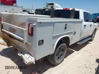 2023 Ram 2500 Big Horn with VIN 3C6UR5JL1PG651289, listed as a IAAI auction lot 42460464 with 65,567 mi miles and . Bid and sale history available at DreamBid. Image 4.