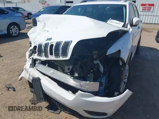 2019 Jeep Cherokee Latitude Plus with VIN 1C4PJLLB4KD455861, listed as a IAAI auction lot 41975695 with 104,413 mi miles. Bid and sale history available at carsss.com. Image 6.
