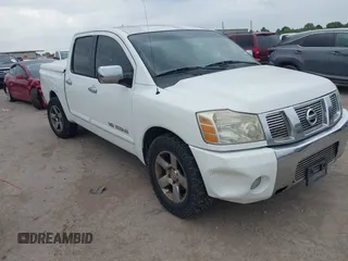 2005 Nissan Titan LE with VIN 1N6BA07A95N530205, listed as a IAAI auction lot 42843573 with 135,041 mi miles and . Bid and sale history available at DreamBid. Image 1.