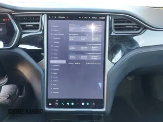 2020 Tesla Model S Long Range with VIN 5YJSA1E23LF381872, listed as a IAAI auction lot 41763046 with 96,720 mi miles and . Bid and sale history available at DreamBid. Image 19.