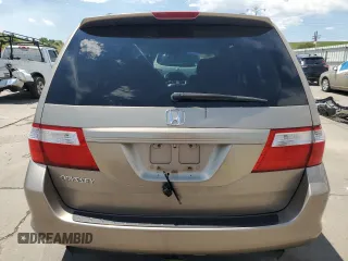 2006 Honda Odyssey EX with VIN 5FNRL38426B401762, listed as a Copart auction lot 61018525 with 145,370 mi miles and Salvage title. Bid and sale history available at DreamBid. Image 6.