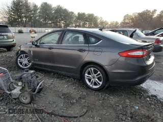 2016 Ford Fusion SE Hybrid with VIN 3FA6P0LU5GR127038, listed as a Copart auction lot 79508174 with 56,555 mi miles and Salvage Title. Bid and sale history available at carsss.com. Image 2.