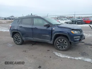 2020 Jeep Compass Trailhawk with VIN 3C4NJDDB3LT143926, listed as a IAAI auction lot 41368613 with 61,909 mi miles and . Bid and sale history available at carsss.com. Image 13.