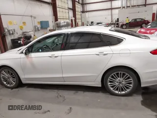 2016 Ford Fusion SE с VIN 3FA6P0H90GR194232, выставлен на аукционе IAAI как лот 42452759 с пробегом 99 310 миль миль и . История ставок и продаж доступна на DreamBid. Изображение 14.