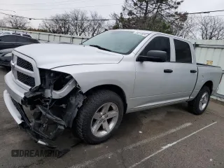 2015 Ram 1500 Express with VIN 1C6RR7KG0FS586039, listed as a Copart auction lot 84012634 with 103,030 mi miles and Salvage title. Bid and sale history available at DreamBid. Image 1.