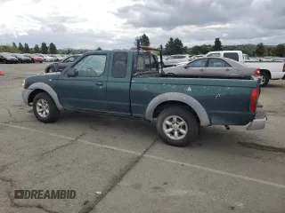 2002 Nissan Frontier XE with VIN 1N6DD26S12C332098, listed as a Copart auction lot 54601975 with 316,966 mi miles and Clean title. Bid and sale history available at DreamBid. Image 2.