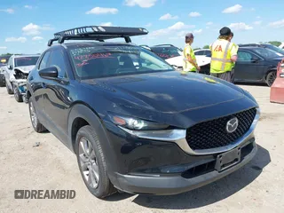 2023 Mazda CX-30 S Preferred with VIN 3MVDMBCM5PM588600, listed as a IAAI auction lot 42250467 with 24,027 mi miles and . Bid and sale history available at DreamBid. Image 1.