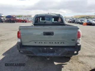 2023 Toyota Tacoma SR with VIN 3TMCZ5AN3PM563612, listed as a Copart auction lot 53995225 with 37,699 mi miles and Salvage title. Bid and sale history available at DreamBid. Image 6.