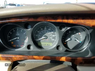 2005 Jaguar XJ with VIN SAJWA79C15SG47018, listed as a Copart auction lot 43087185 with 31,725 mi miles and Salvage Title. Bid and sale history available at carsss.com. Image 9.