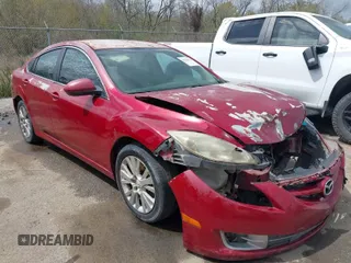 2009 Mazda 6 i Grand Touring with VIN 1YVHP82A995M01575, listed as a IAAI auction lot 41833121 with Not Provided miles. Bid and sale history available at carsss.com. Image 1.
