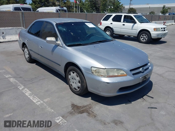 1999 Honda Accord LX with VIN JHMCG665XXC033464, listed as a IAAI auction lot 42687150 with 194,076 mi miles and . Bid and sale history available at DreamBid. Image 6.