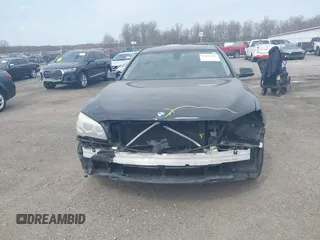 2015 BMW 7 Series 740Li xDrive with VIN WBAYF4C55FD874116, listed as a IAAI auction lot 41877144 with 156,280 mi miles. Bid and sale history available at carsss.com. Image 13.