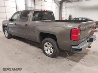 2015 Chevrolet Silverado 1500 LT with VIN 3GCUKREC5FG207488, listed as a IAAI auction lot 41472511 with 167,448 mi miles. Bid and sale history available at carsss.com. Image 3.