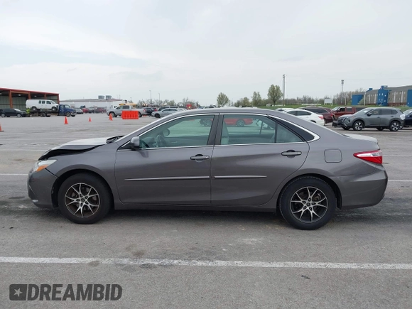 2015 Toyota Camry XLE with VIN 4T4BF1FK5FR483736, listed as a IAAI auction lot 41933106 with 104,468 mi miles. Bid and sale history available at carsss.com. Image 14.