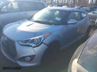 2016 Hyundai Veloster Turbo with VIN KMHTC6AE7GU264753, listed as a IAAI auction lot 41699222 with 999,999 mi miles. Bid and sale history available at carsss.com. Image 2.