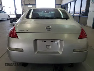 2003 Nissan 350Z Touring с VIN JN1AZ34D03T114076, выставлен на аукционе Copart как лот 61078255 с пробегом 187 952 миль миль и Списание • Salvage title. История ставок и продаж доступна на DreamBid. Изображение 6.