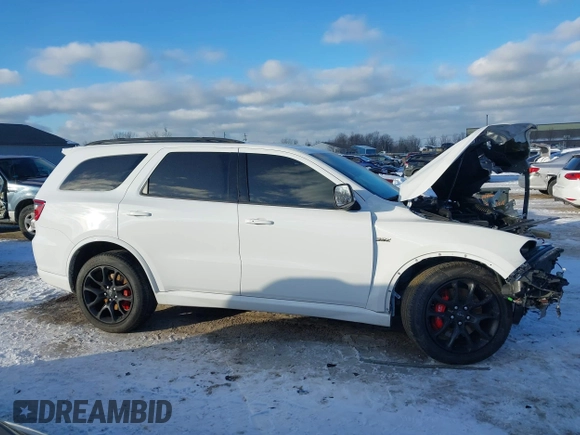 2023 Dodge Durango SRT 392 Premium with VIN 1C4SDJGJ3PC668238, listed as a IAAI auction lot 41305050 with 5,099 mi miles and . Bid and sale history available at DreamBid. Image 12.