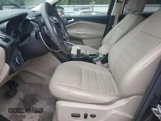 2015 Ford Escape Titanium with VIN 1FMCU0J96FUC00683, listed as a Copart auction lot 58345105 with 61,031 mi miles and Salvage title. Bid and sale history available at DreamBid. Image 7.