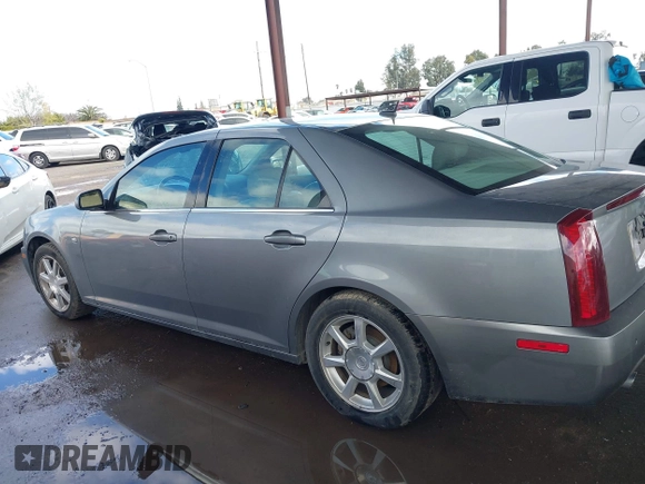 2005 Cadillac STS z VIN 1G6DW677X50185643, wystawiony jako IAAI lot #41730111 z przebiegiem 218 764 mil mil oraz . Historia ofert i sprzedaży dostępna na DreamBid. Obrazek 14.