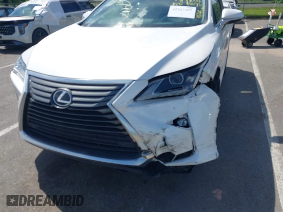 2016 Lexus RX 350 z VIN 2T2BZMCA1GC018531, wystawiony jako IAAI lot #42267497 z przebiegiem 182 473 mil mil oraz . Historia ofert i sprzedaży dostępna na DreamBid. Obrazek 6.