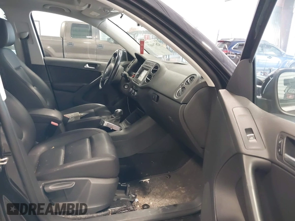 2012 Volkswagen Tiguan SE with VIN WVGBV7AX2CW503301, listed as a IAAI auction lot 42679407 with 90,603 mi miles and . Bid and sale history available at DreamBid. Image 5.