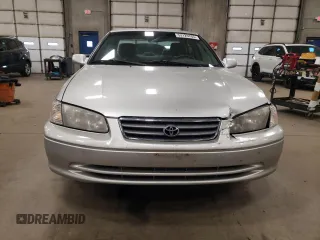 2000 Toyota Camry CE z VIN JT2BG22K1Y0483646, wystawiony jako Copart lot #53129705 z przebiegiem 187 418 mil mil oraz Szkoda całkowita • Salvage title. Historia ofert i sprzedaży dostępna na DreamBid. Obrazek 5.