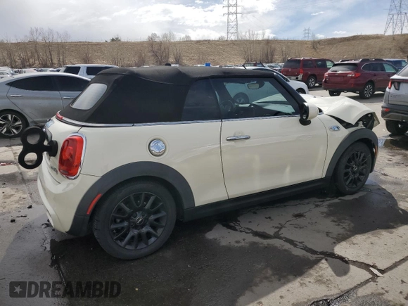 2016 MINI Convertible S с VIN WMWWG9C54G3C21935, выставлен на аукционе Copart как лот 49302455 с пробегом 63 579 миль миль и Списание • Salvage title. История ставок и продаж доступна на DreamBid. Изображение 3.
