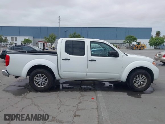 2016 Nissan Frontier SV z VIN 1N6AD0ER7GN737013, wystawiony jako IAAI lot #42106586 z przebiegiem 54 218 mil mil oraz . Historia ofert i sprzedaży dostępna na DreamBid. Obrazek 13.
